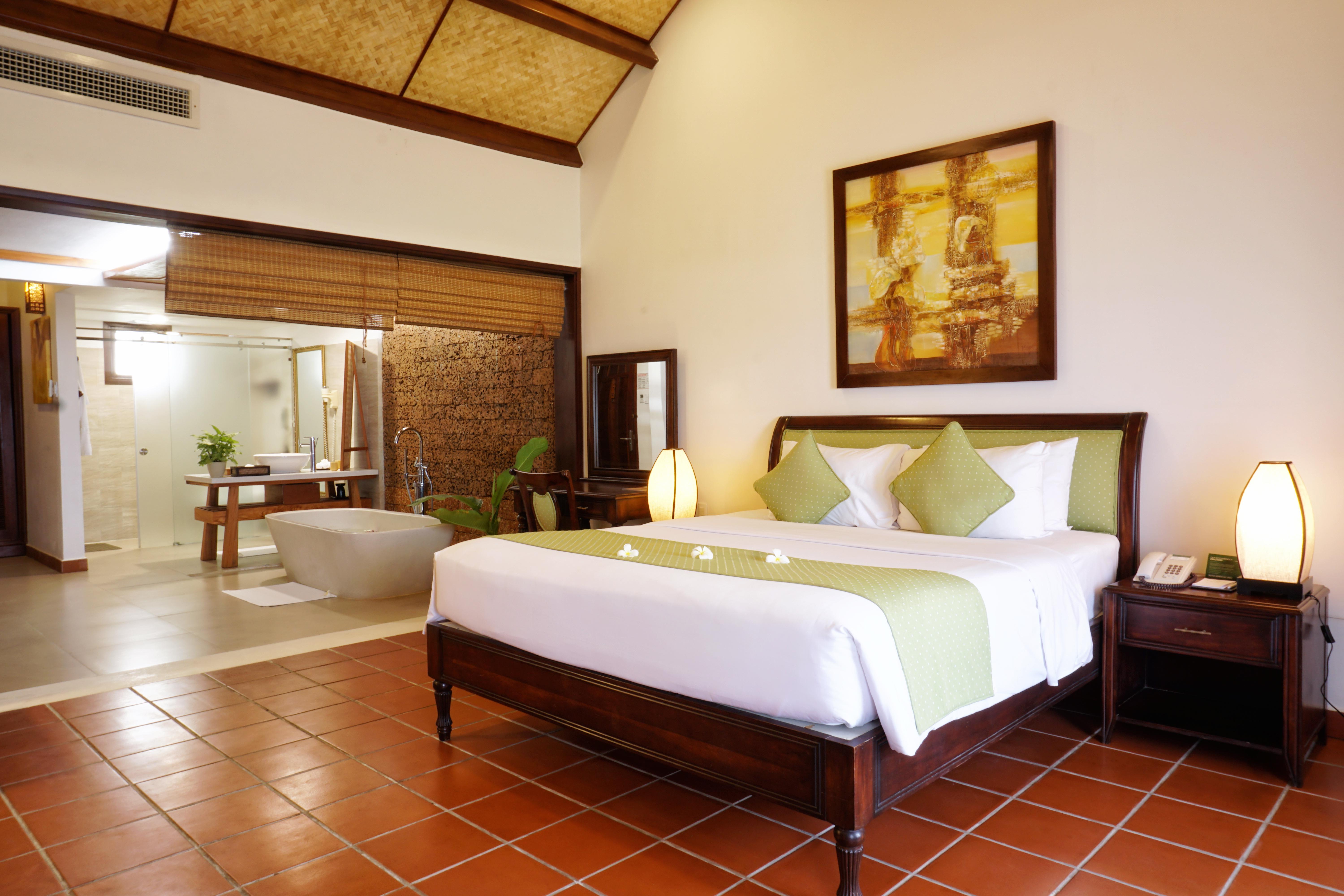 منتجع وسبا بالم غاردن بيتش هوي ان المظهر الخارجي الصورة A bedroom at the resort